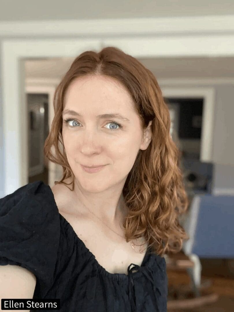 Smiling woman with curly hair